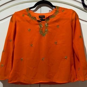 orange long sleeve blouse w/ green detail